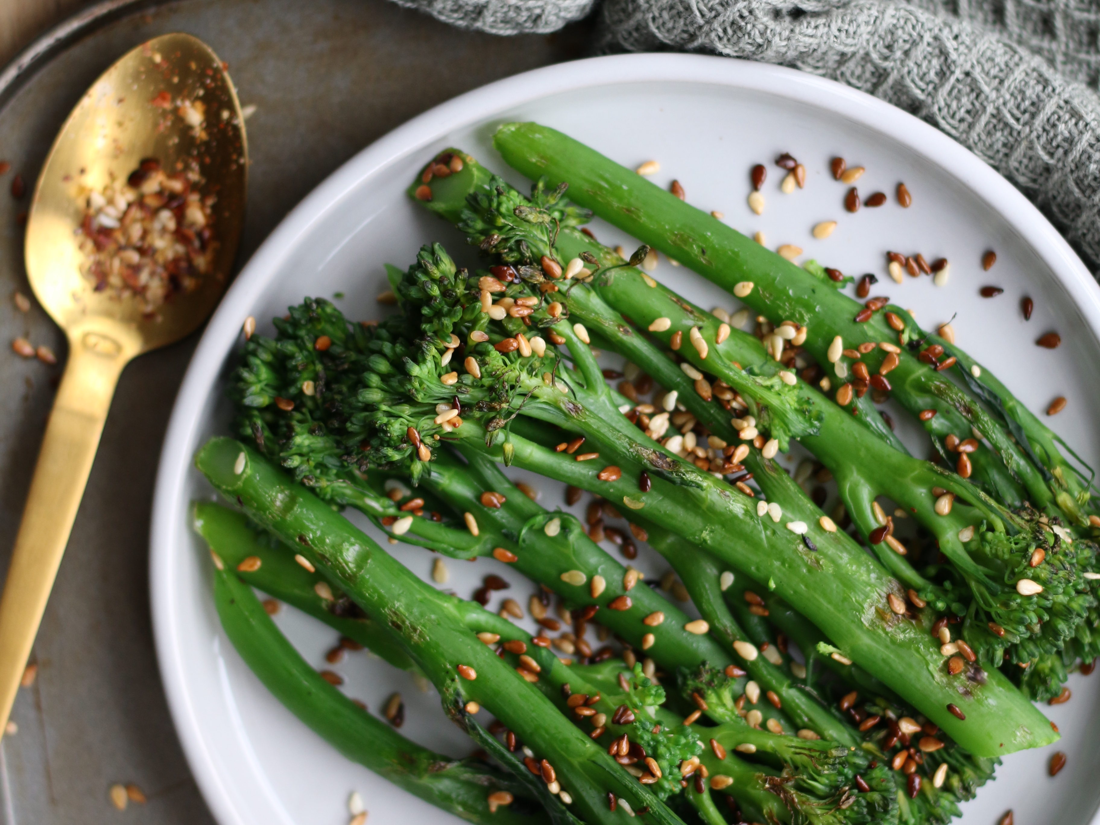 charred tenderstem with ginger and tamari dressing