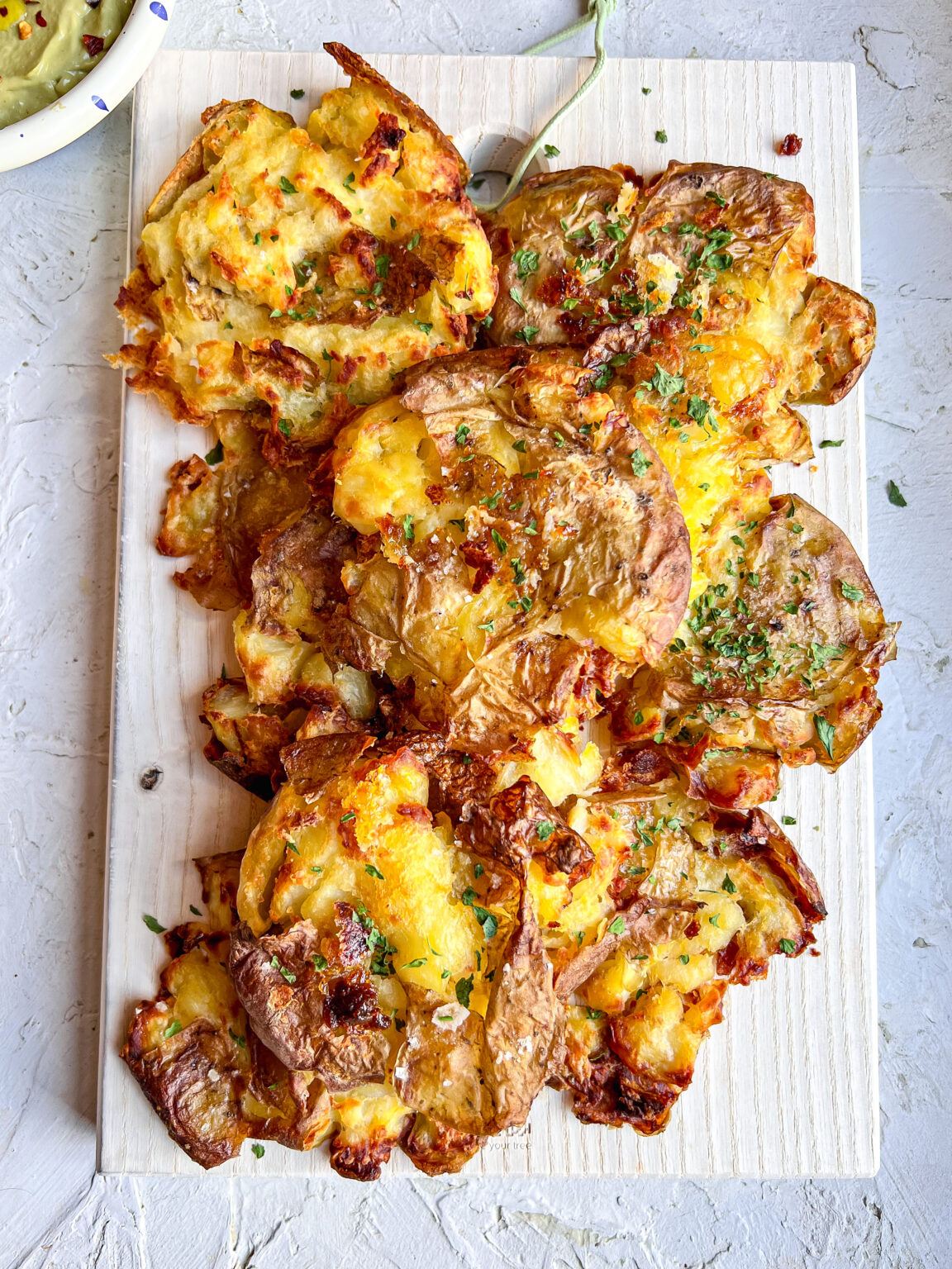 Smashed Potatoes With Avocado Garlic Dip - Lucy & Lentils